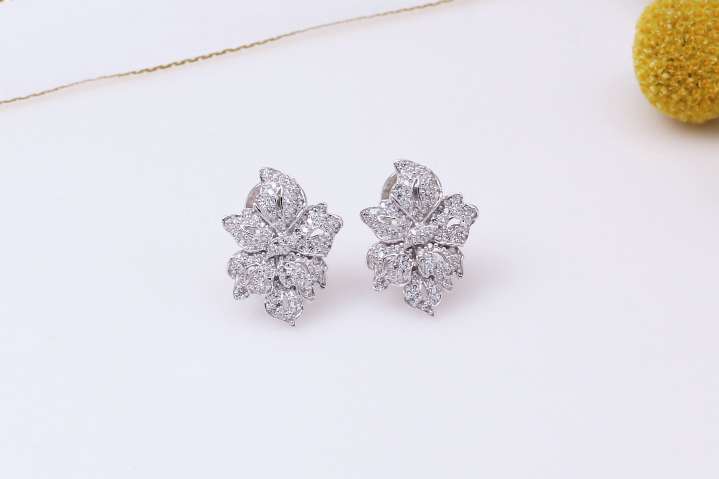 Graceful Bloom Earrings – Sterling Silver with White Mosaic Detailing
